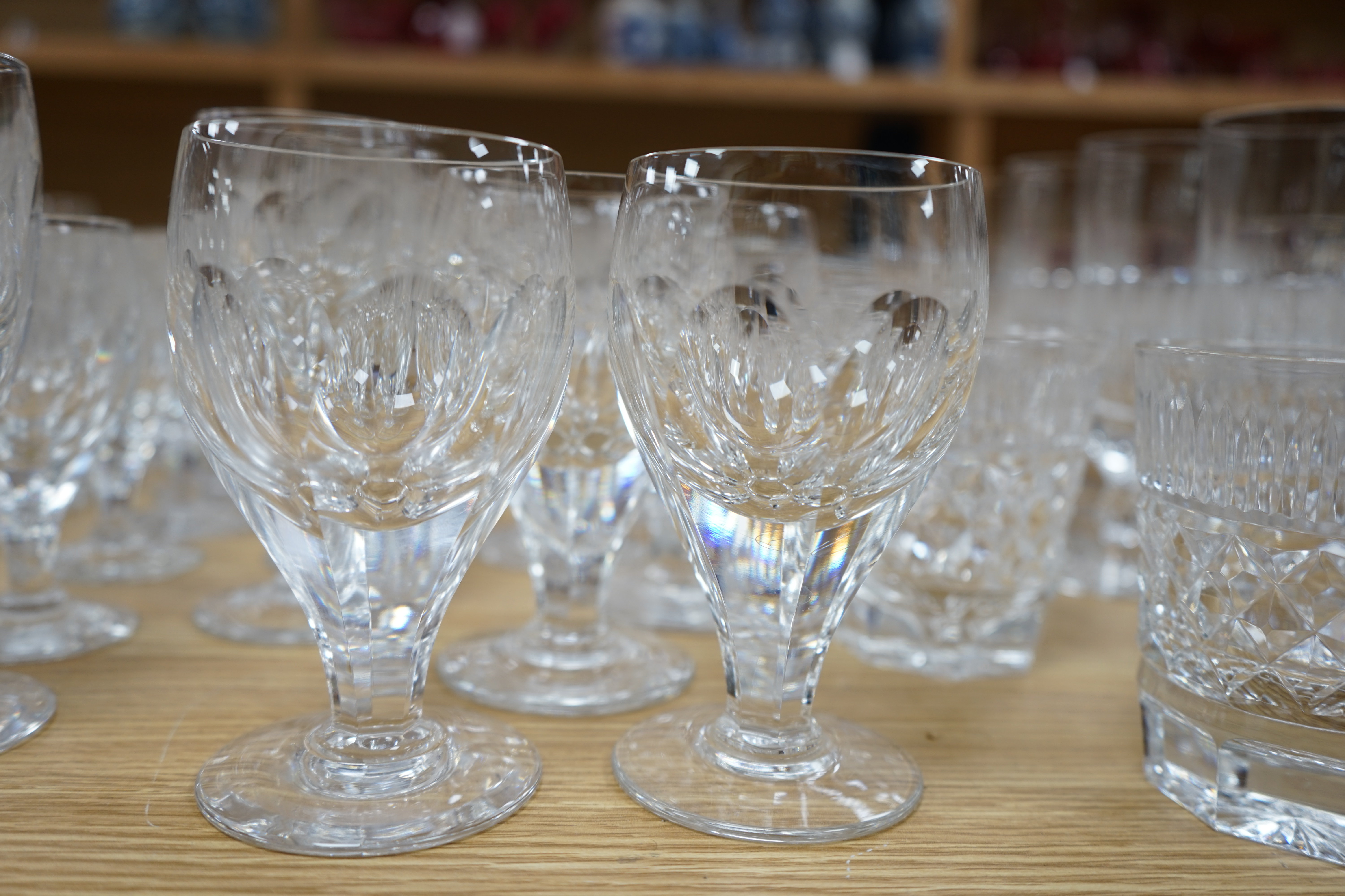 A collection of drinking glasses, including wine glasses, tumblers, champagne flutes, etc. Condition - good.